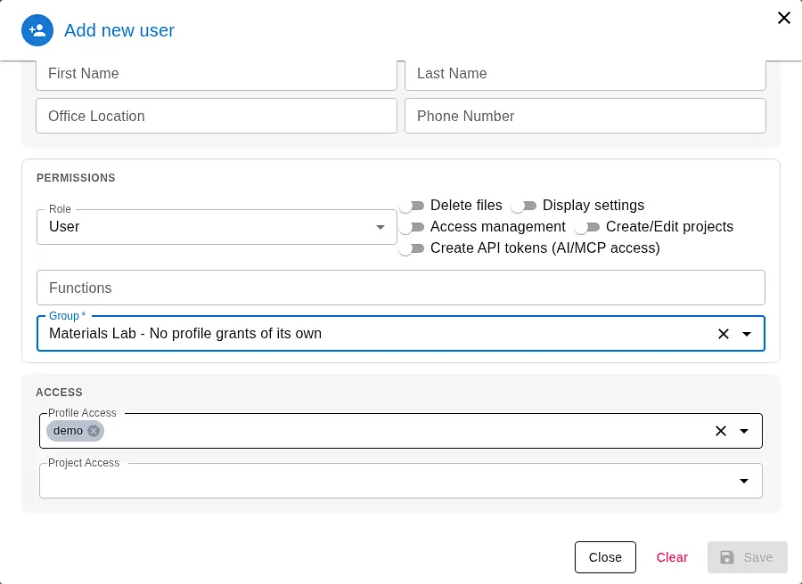 Add new user dialog with role, group and workspace access set before saving